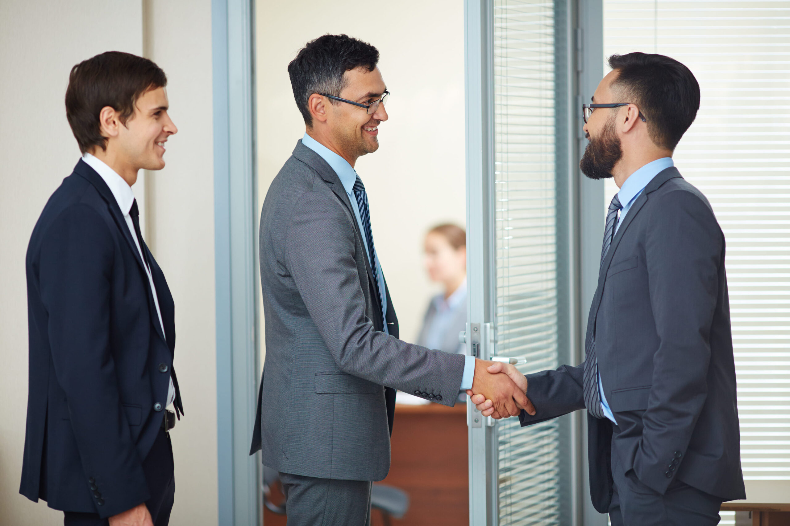 businessmen-closing-deal-with-handshake